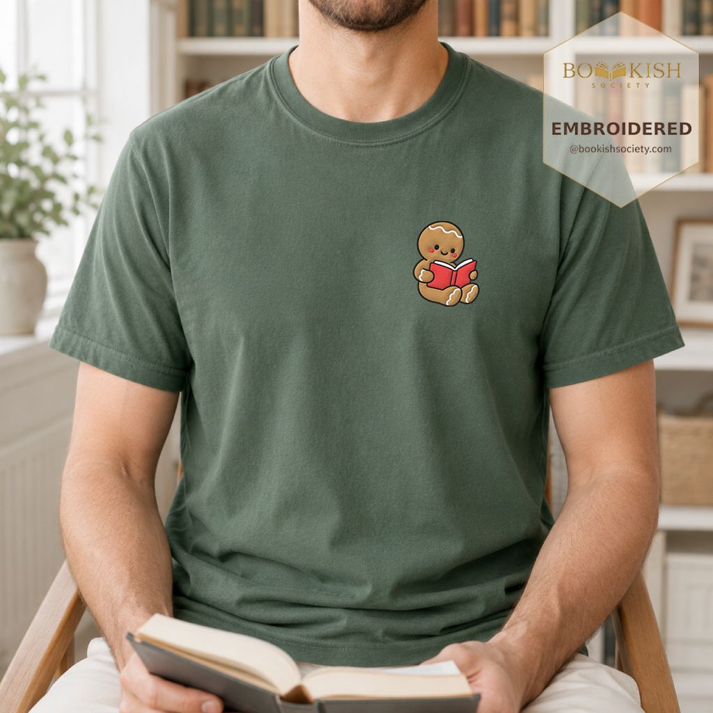 Gingerbread Character With Red Book Embroidered T-Shirt | Christmas Reader Gift Moss