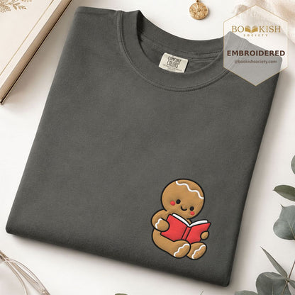 Gingerbread Character With Red Book Embroidered T-Shirt | Christmas Reader Gift Pepper