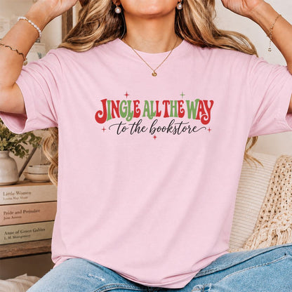 Jingle All The Way To The Bookstore Printed T-Shirt | Christmas Reader Gift Light Pink