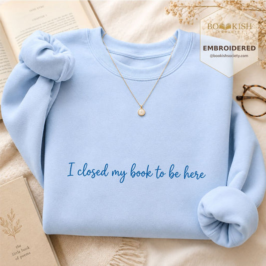 I Closed My Book To Be Here Embroidered Sweatshirt | Funny Introvert Reader Gift Light Blue