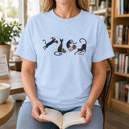 Playful Black Cats Printed T-Shirt | Christmas Book Lover Gift Light Blue