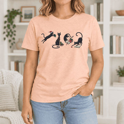 Playful Black Cats Ultra-Soft Cotton T-Shirt | Christmas Book Lover Gift Heather Peach