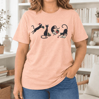Playful Black Cats Ultra-Soft Cotton T-Shirt | Christmas Book Lover Gift Heather Peach