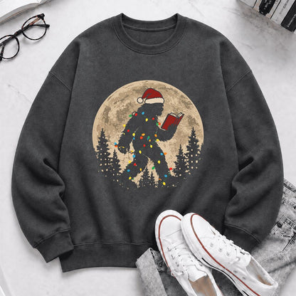Big Foot Wearing Christmas Hat Printed Sweatshirt | Christmas Reader Gift Dark Heather