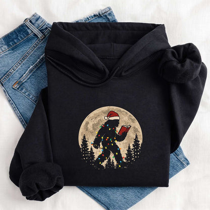 Big Foot Wearing Christmas Hat Softstyle Hoodie | Christmas Reader Gift Black
