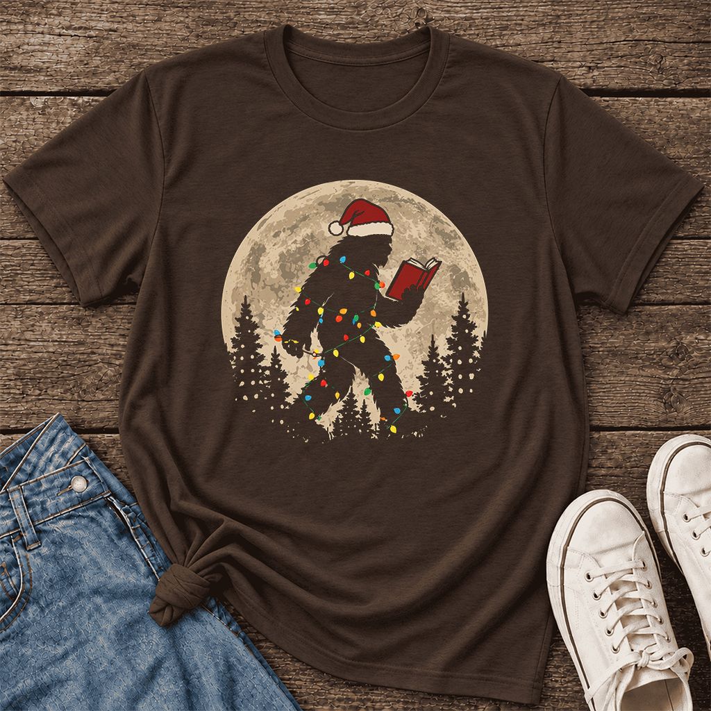 Big Foot Wearing Christmas Hat Ultra-Soft Cotton T-Shirt | Christmas Reader Gift Brown