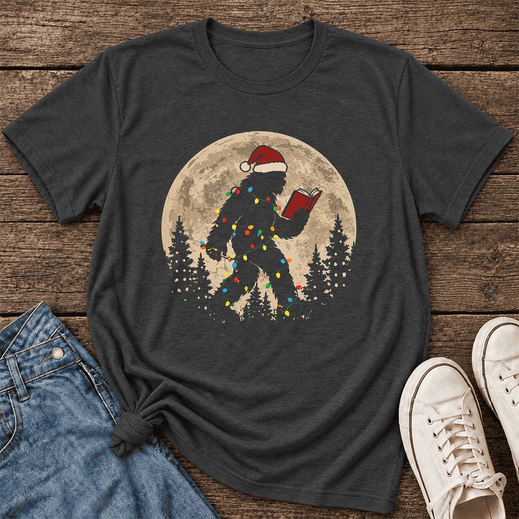 Big Foot Wearing Christmas Hat Ultra-Soft Cotton T-Shirt | Christmas Reader Gift Dark Grey Heather