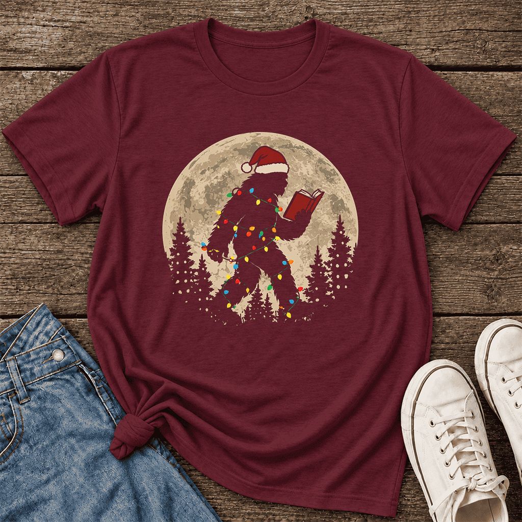 Big Foot Wearing Christmas Hat Ultra-Soft Cotton T-Shirt | Christmas Reader Gift Maroon