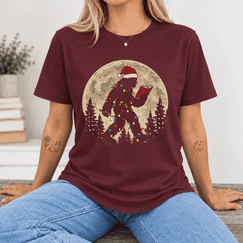 Big Foot Wearing Christmas Hat Ultra-Soft Cotton T-Shirt | Christmas Reader Gift Maroon