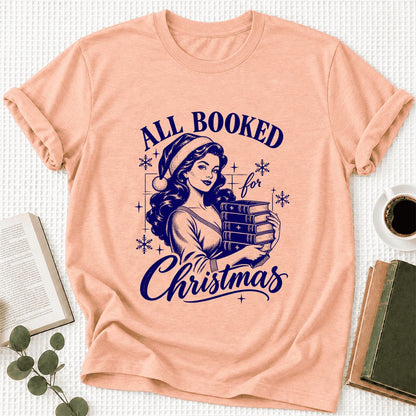 All Booked For Christmas Ultra-Soft Cotton T-Shirt | Christmas Reader Gift Heather Peach