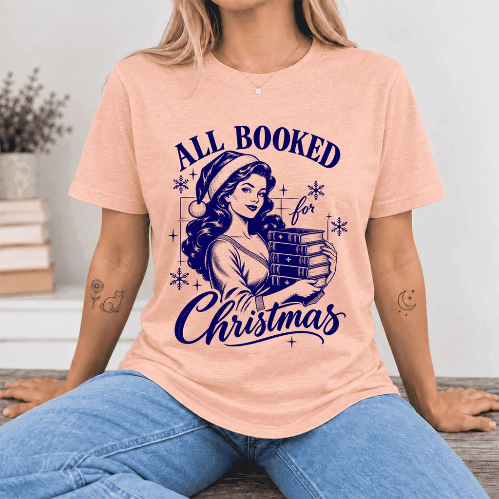 All Booked For Christmas Ultra-Soft Cotton T-Shirt | Christmas Reader Gift Heather Peach