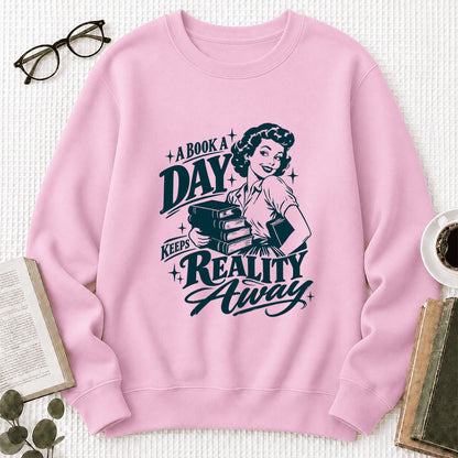 A Book A Day Keeps Reality Away Printed Sweatshirt | Cozy Book Lover Gift Light Pink