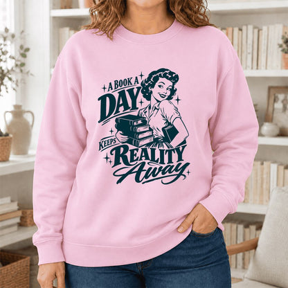 A Book A Day Keeps Reality Away Printed Sweatshirt | Cozy Book Lover Gift Light Pink