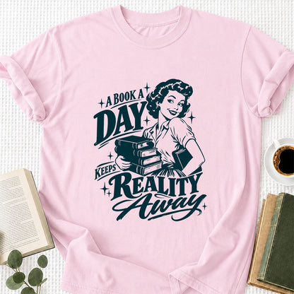 A Book A Day Keeps Reality Away Printed T-Shirt | Cozy Book Lover Gift Light Pink