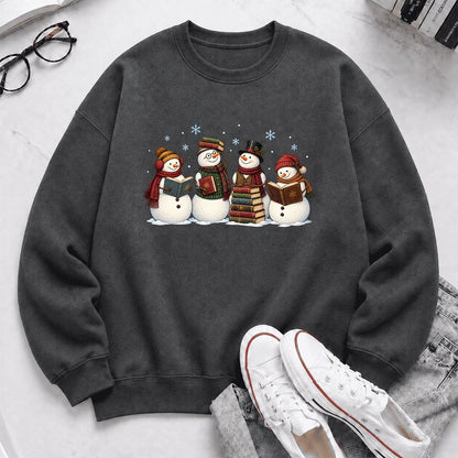 Four Snowmen Reading Printed Sweatshirt | Christmas Book Lover Gift Dark Heather