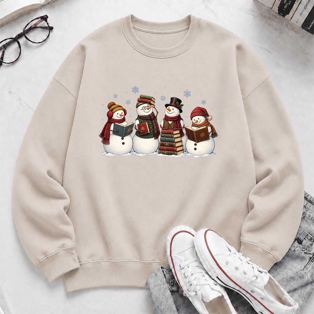 Four Snowmen Reading Printed Sweatshirt | Christmas Book Lover Gift Sand