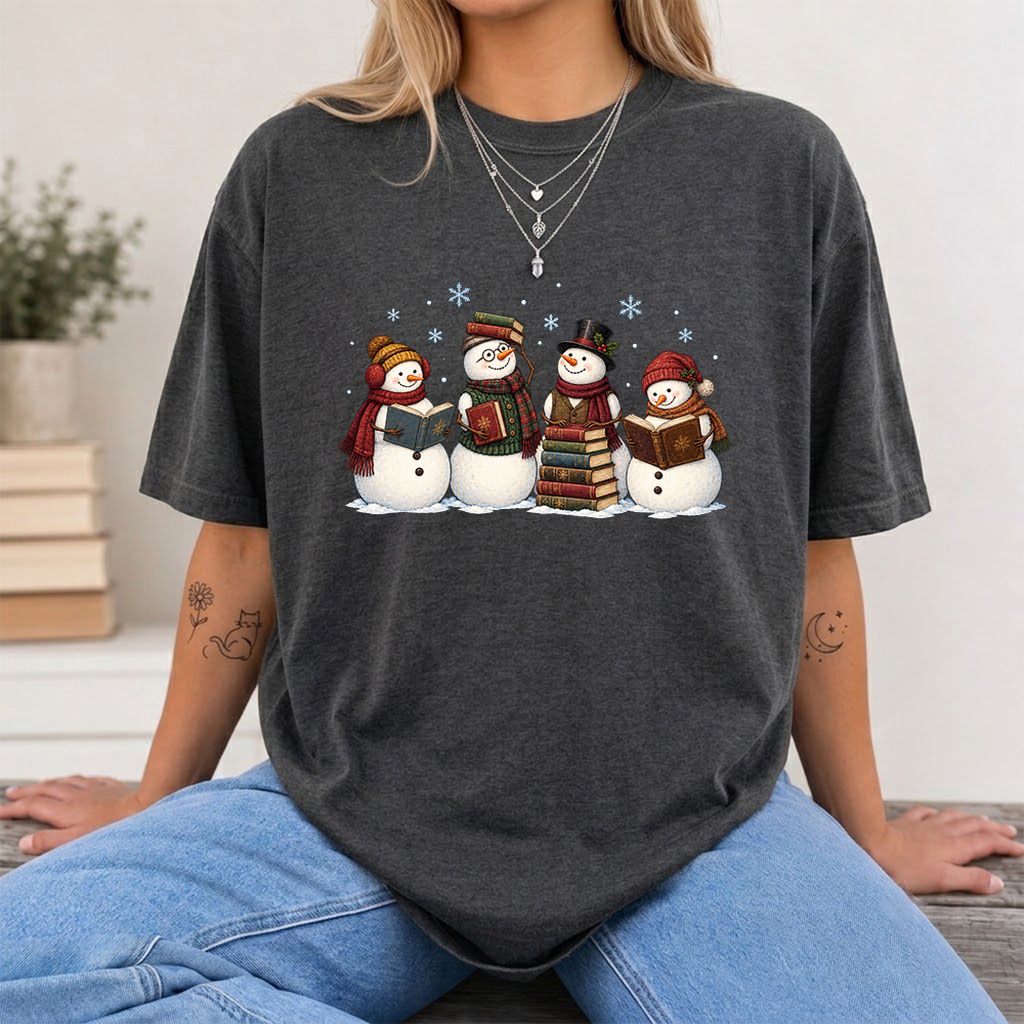 Four Snowmen Reading Printed T-Shirt | Christmas Book Lover Gift Dark Heather