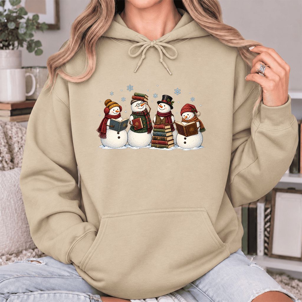 Four Snowmen Reading Softstyle Hoodie | Christmas Book Lover Gift Sand