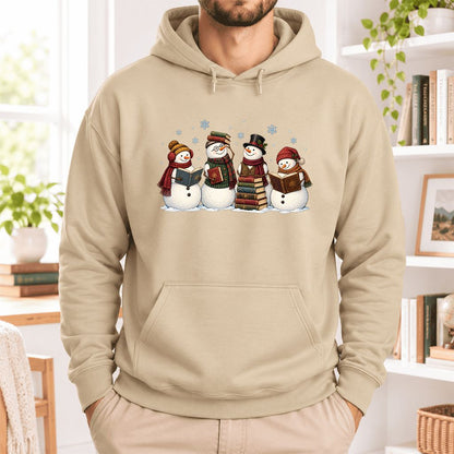 Four Snowmen Reading Softstyle Hoodie | Christmas Book Lover Gift Sand