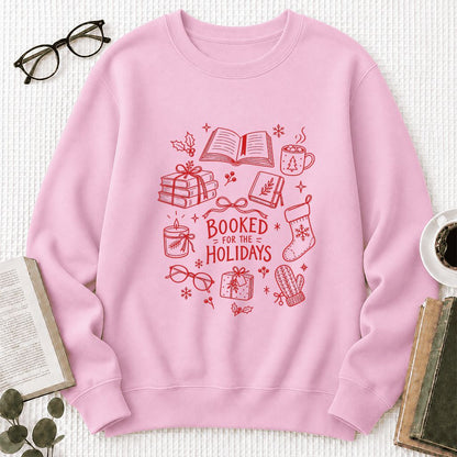Booked For The Holidays Printed Sweatshirt | Christmas Book Lover Gift Light Pink