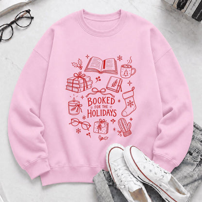 Booked For The Holidays Printed Sweatshirt | Christmas Book Lover Gift Light Pink