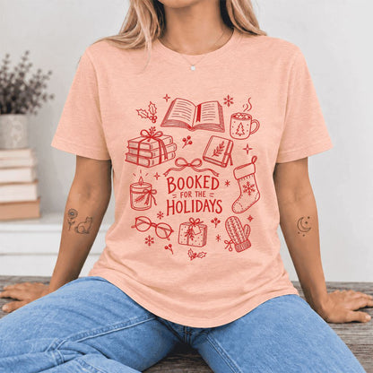 Booked For The Holidays Ultra-Soft Cotton T-Shirt | Christmas Reader Gift Heather Peach