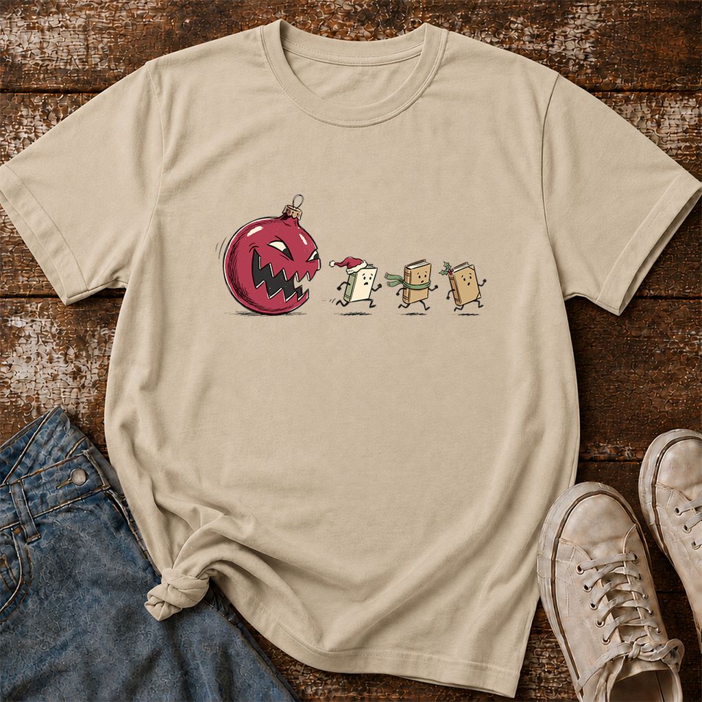 Christmas Book Chase Printed T-Shirt | Holiday Book Lover Gift Sand
