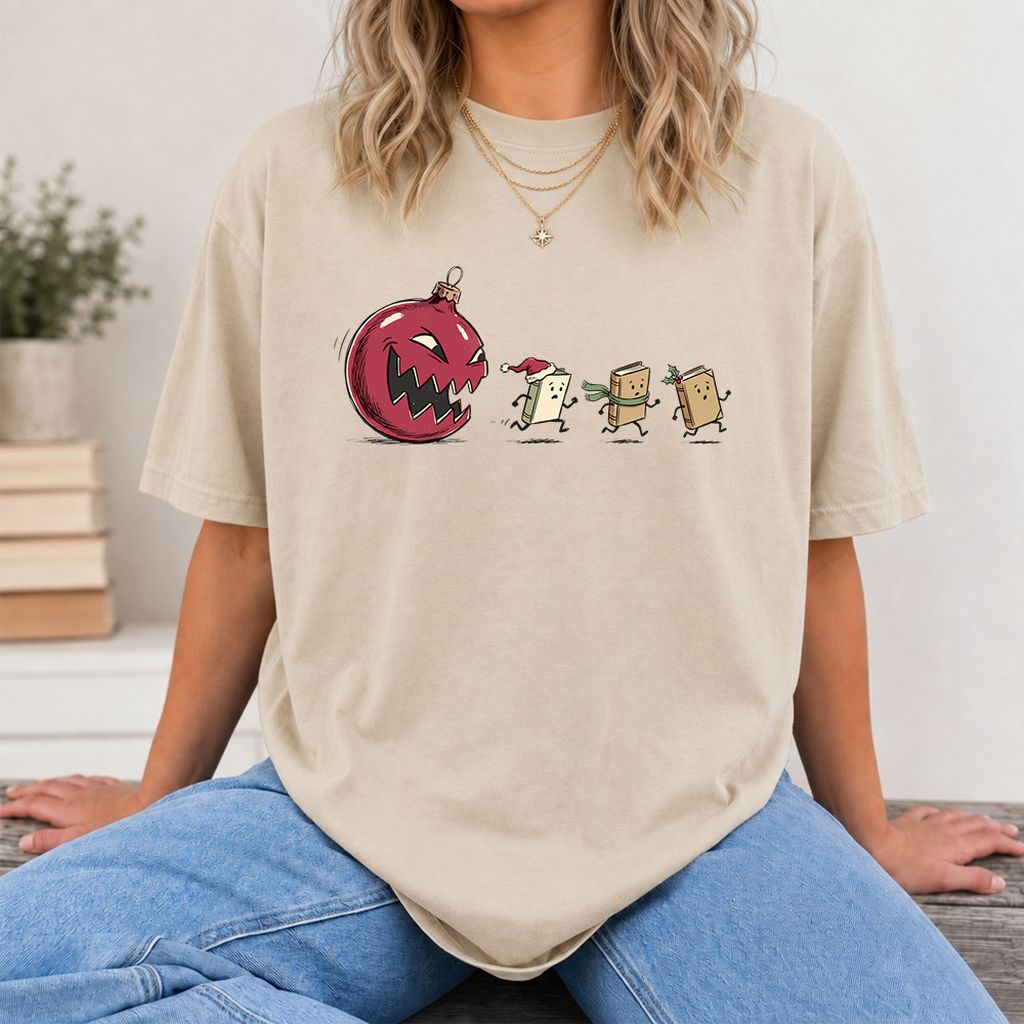 Christmas Book Chase Printed T-Shirt | Holiday Book Lover Gift Sand