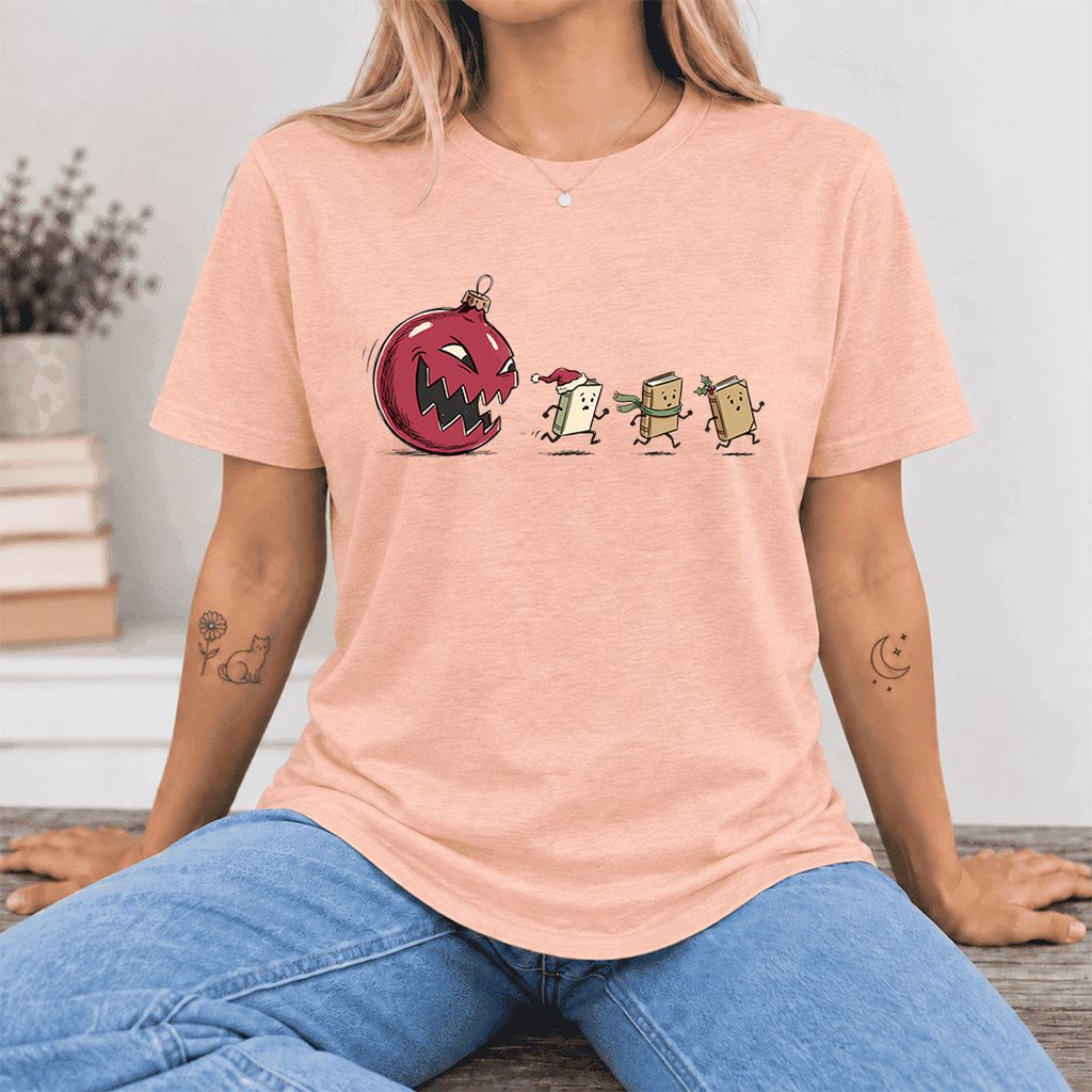 Christmas Book Chase Ultra-Soft Cotton T-Shirt | Holiday Book Lover Gift Heather Peach