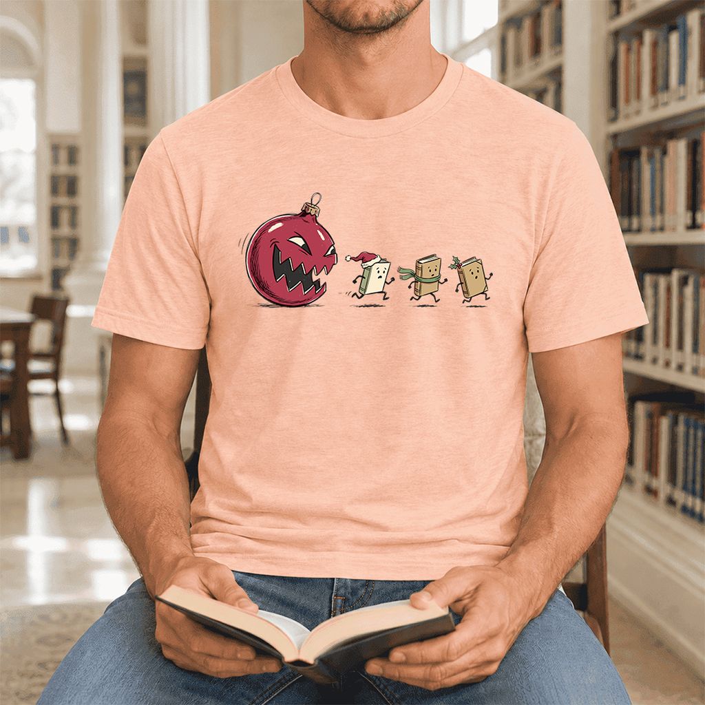 Christmas Book Chase Ultra-Soft Cotton T-Shirt | Holiday Book Lover Gift Heather Peach