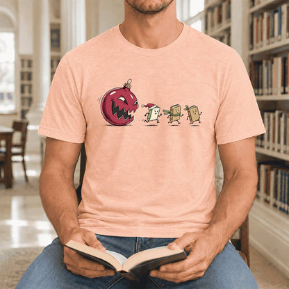 Christmas Book Chase Ultra-Soft Cotton T-Shirt | Holiday Book Lover Gift Heather Peach