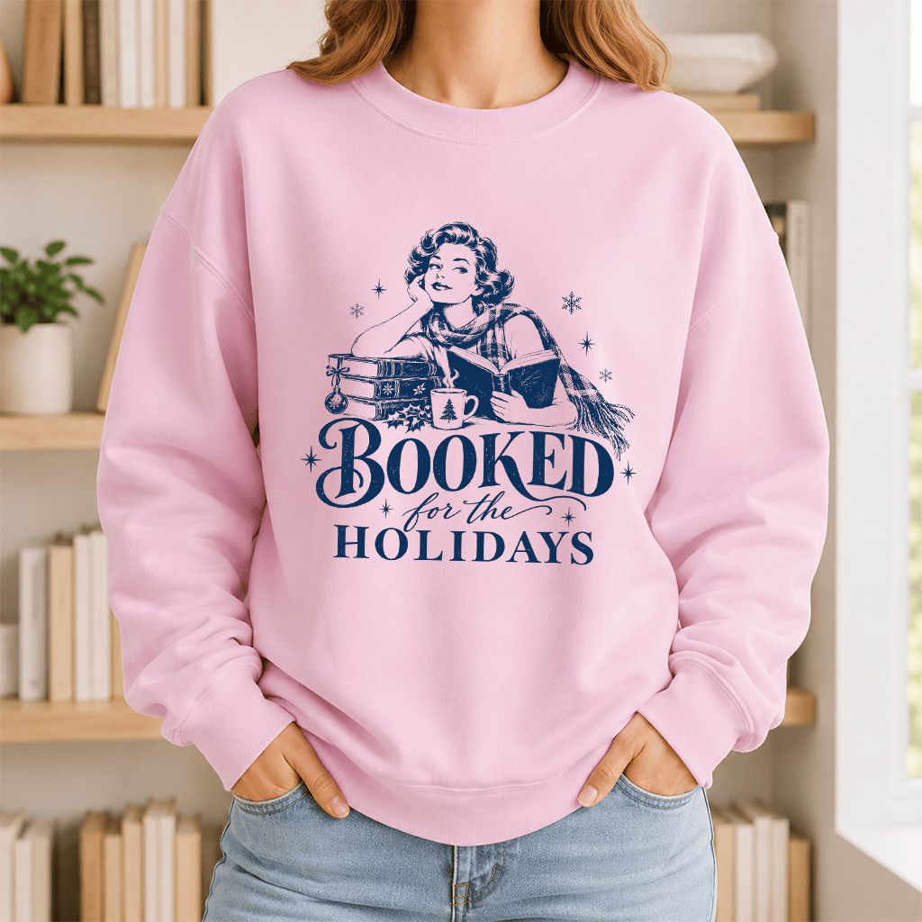 Booked for the Holidays Printed Sweatshirt | Christmas Reader Gift Light Pink
