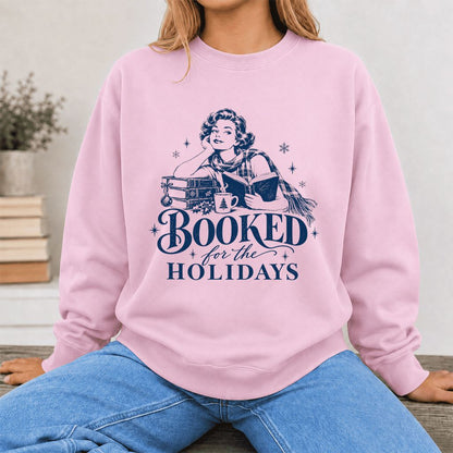 Booked for the Holidays Printed Sweatshirt | Christmas Reader Gift Light Pink