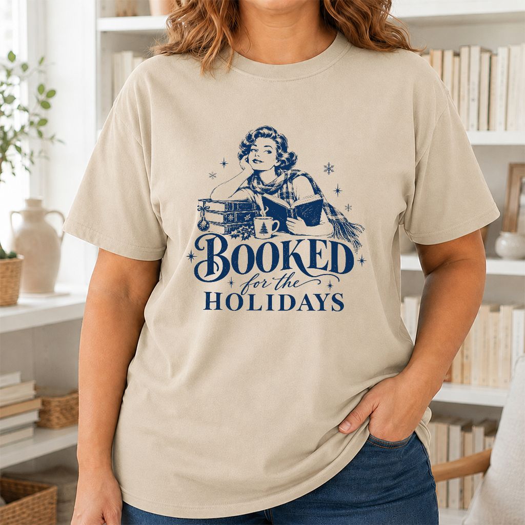 Booked for the Holidays Printed T-Shirt | Christmas Reader Gift Sand