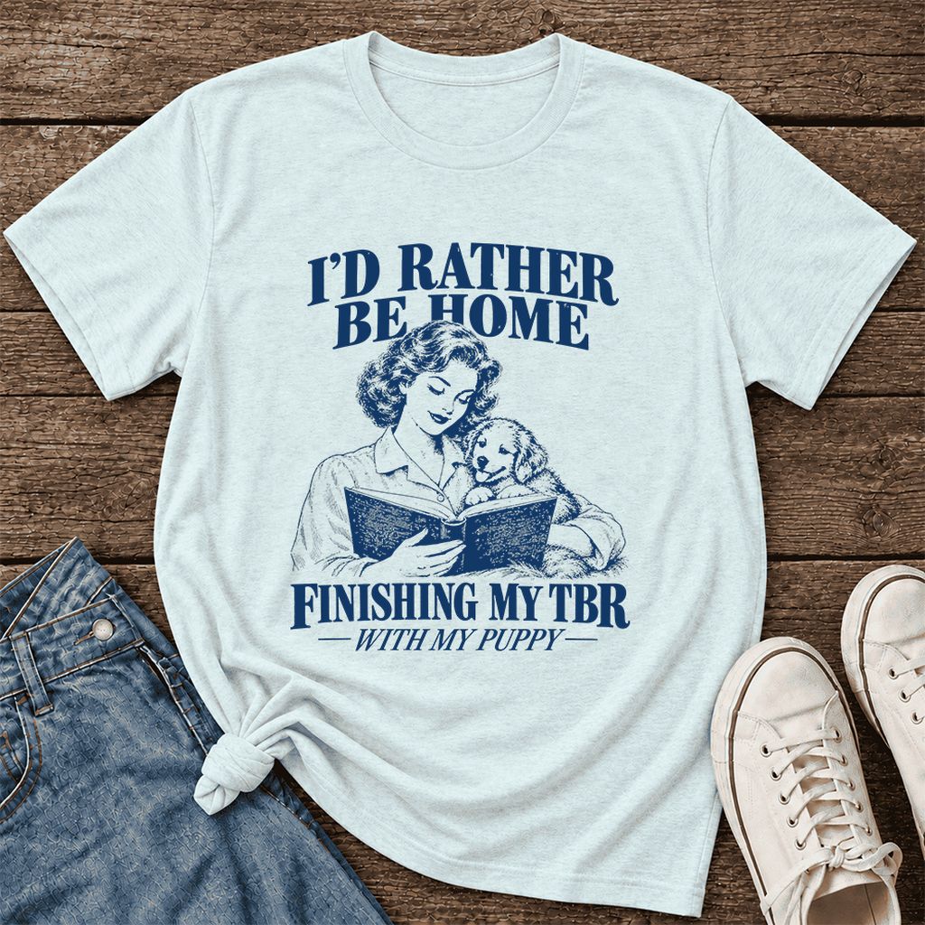 Be Home Finishing My TBR With My Puppy Ultra-Soft Cotton T-Shirt | Gift Heather Ice Blue