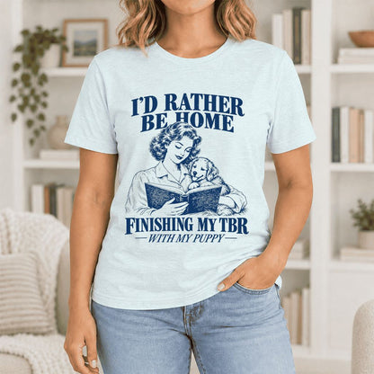 Be Home Finishing My TBR With My Puppy Ultra-Soft Cotton T-Shirt | Gift Heather Ice Blue