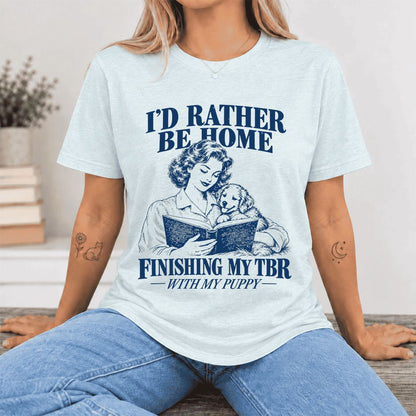 Be Home Finishing My TBR With My Puppy Ultra-Soft Cotton T-Shirt | Gift Heather Ice Blue