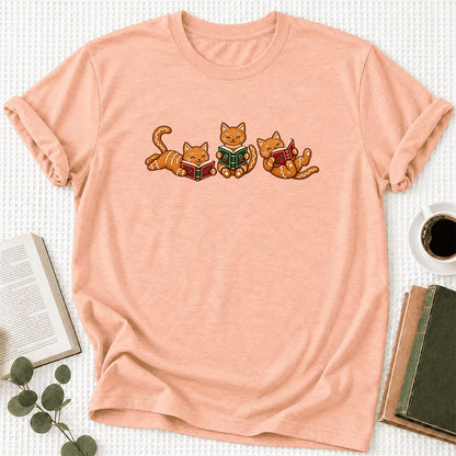 Cozy Gingerbread Cats Reading Books Ultra-Soft Cotton T-Shirt | Christmas Gift Heather Peach