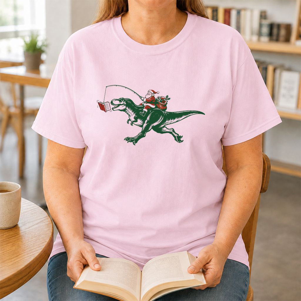 Santa Riding T-Rex Printed T-Shirt | Christmas Reader Gift Light Pink