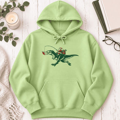 Santa Riding T-Rex Softstyle Hoodie | Christmas Reader Gift Pistachio