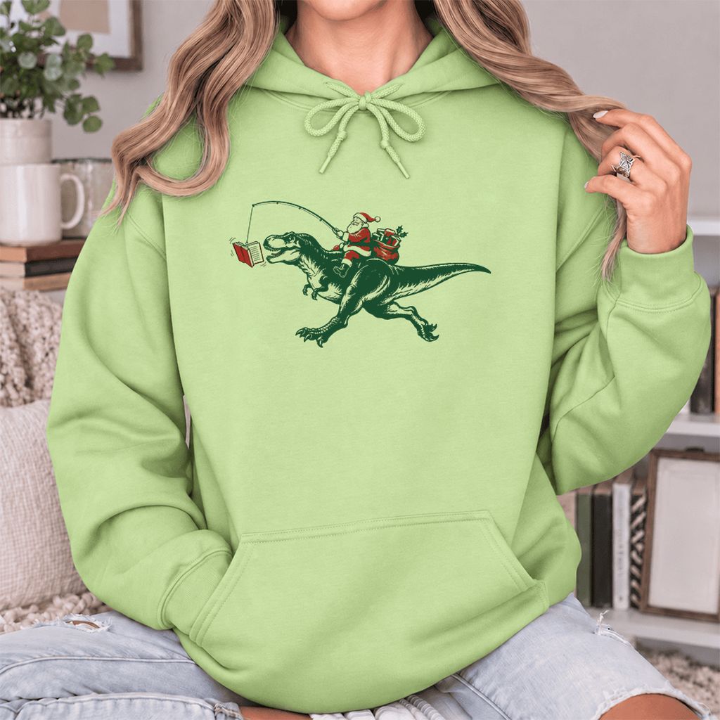 Santa Riding T-Rex Softstyle Hoodie | Christmas Reader Gift Pistachio