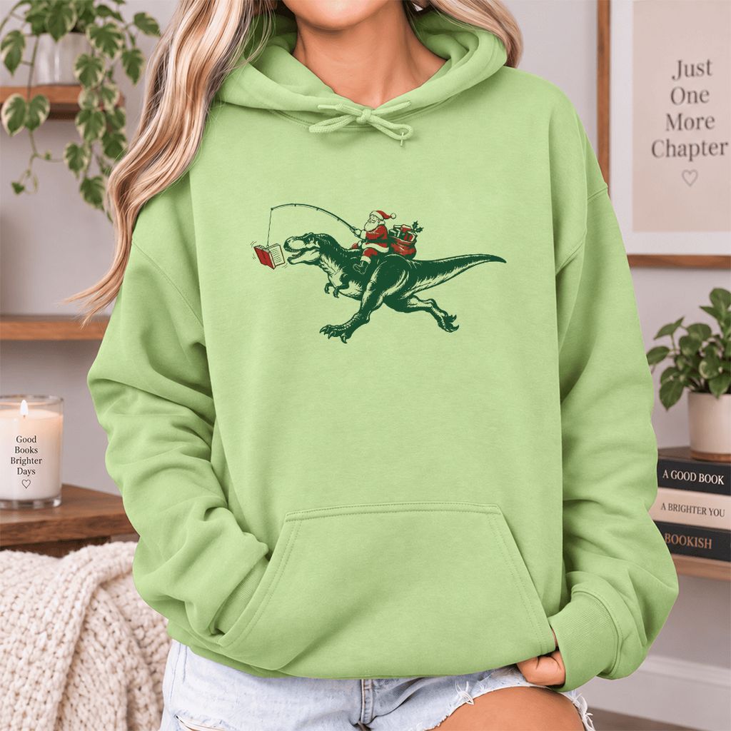 Santa Riding T-Rex Softstyle Hoodie | Christmas Reader Gift Pistachio