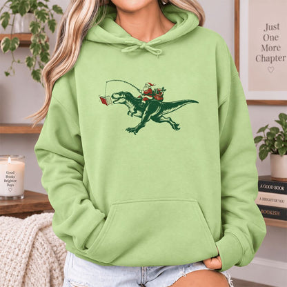 Santa Riding T-Rex Softstyle Hoodie | Christmas Reader Gift Pistachio
