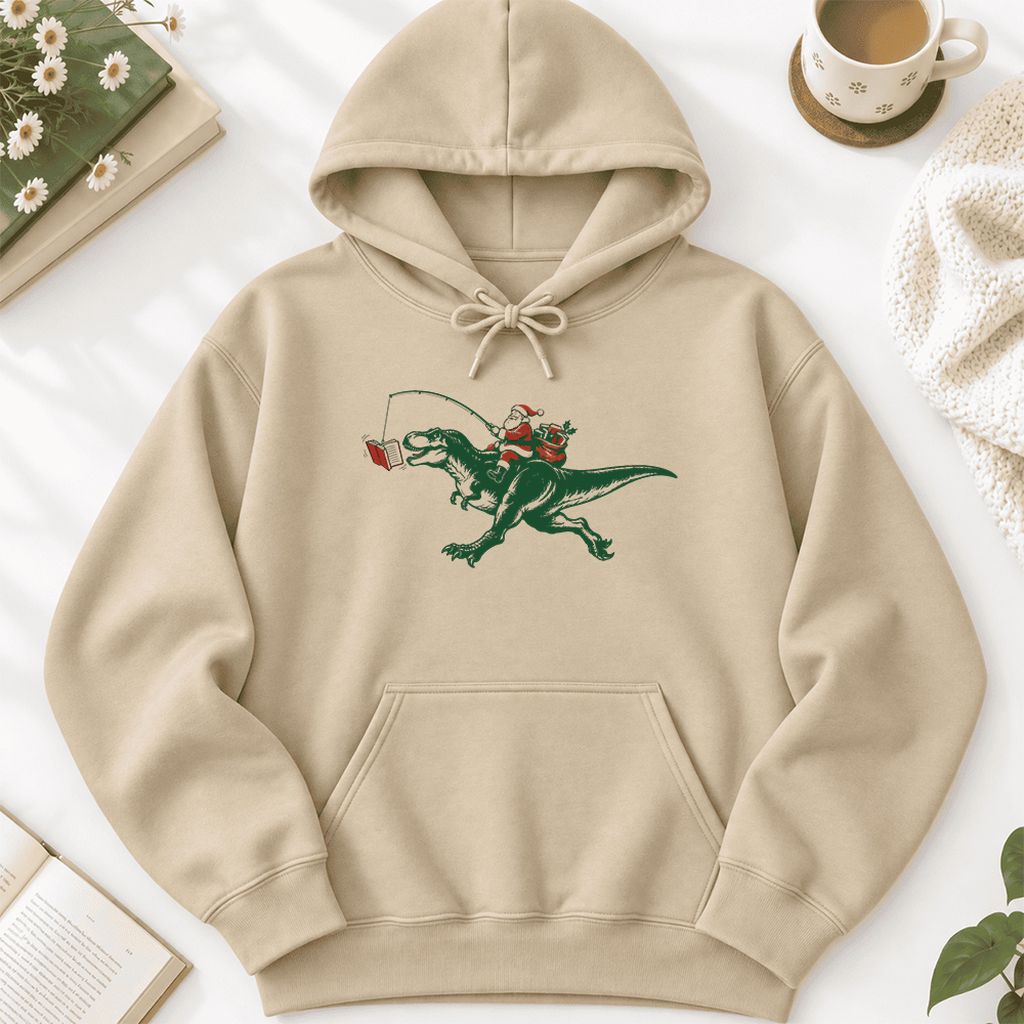 Santa Riding T-Rex Softstyle Hoodie | Christmas Reader Gift Sand