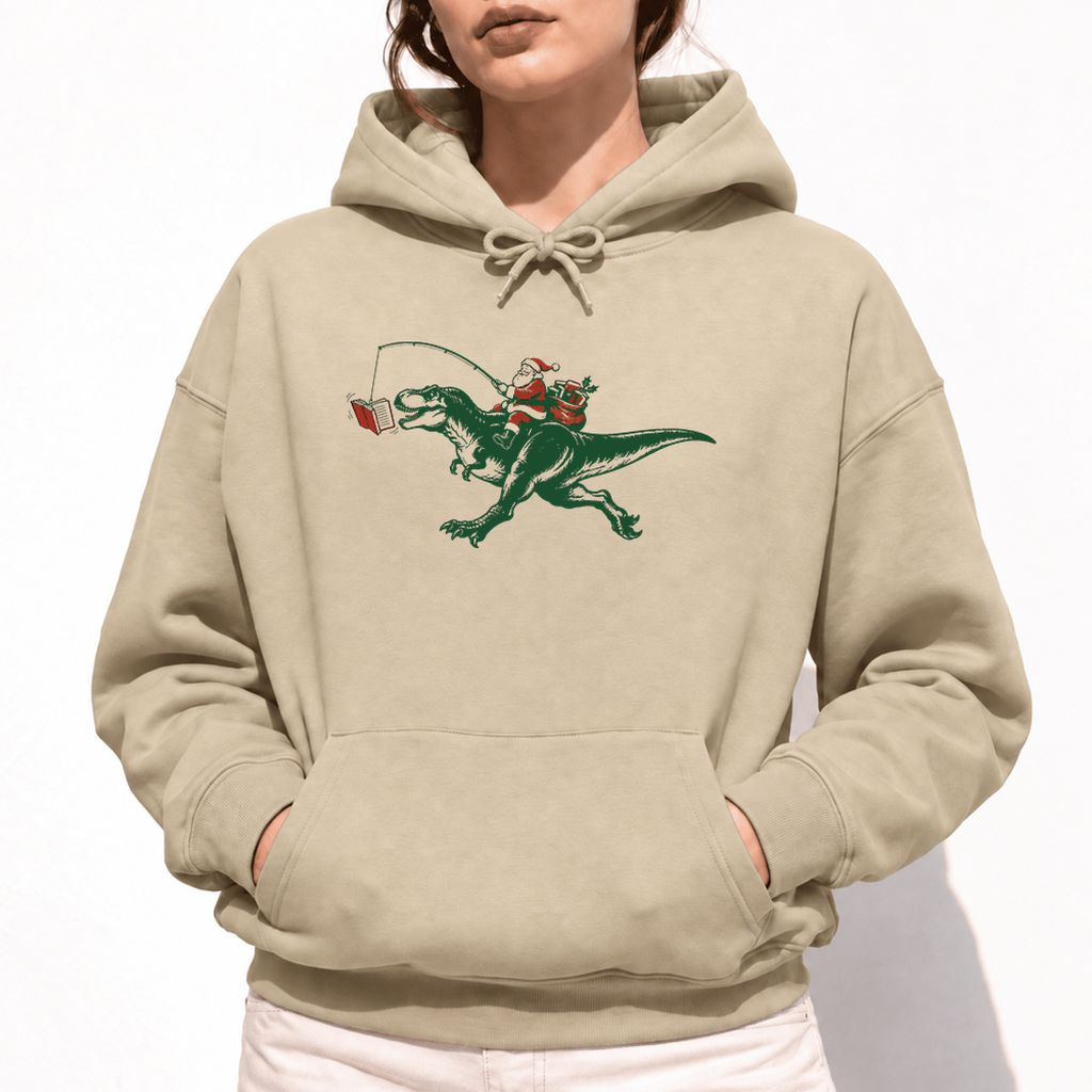 Santa Riding T-Rex Softstyle Hoodie | Christmas Reader Gift Sand