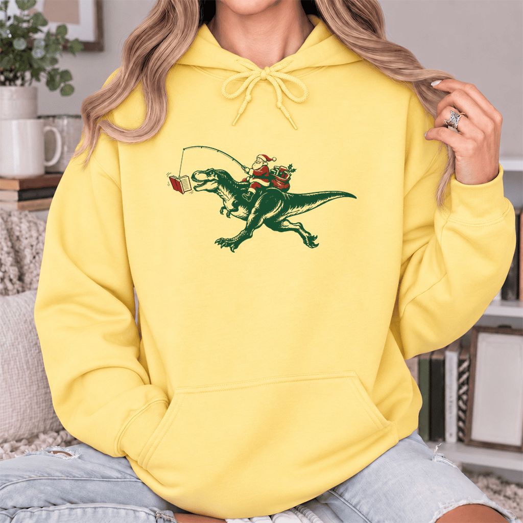 Santa Riding T-Rex Softstyle Hoodie | Christmas Reader Gift Yellow Haze