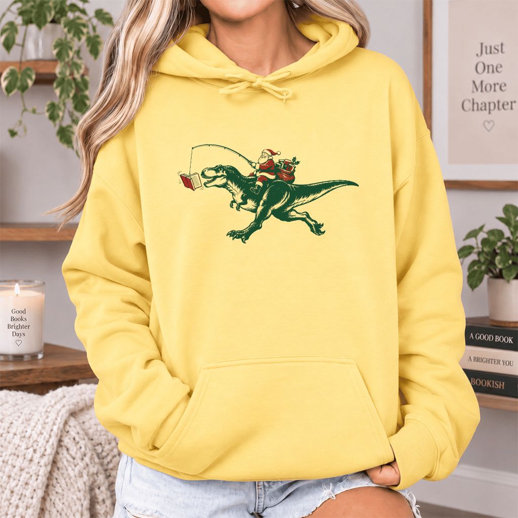 Santa Riding T-Rex Softstyle Hoodie | Christmas Reader Gift Yellow Haze