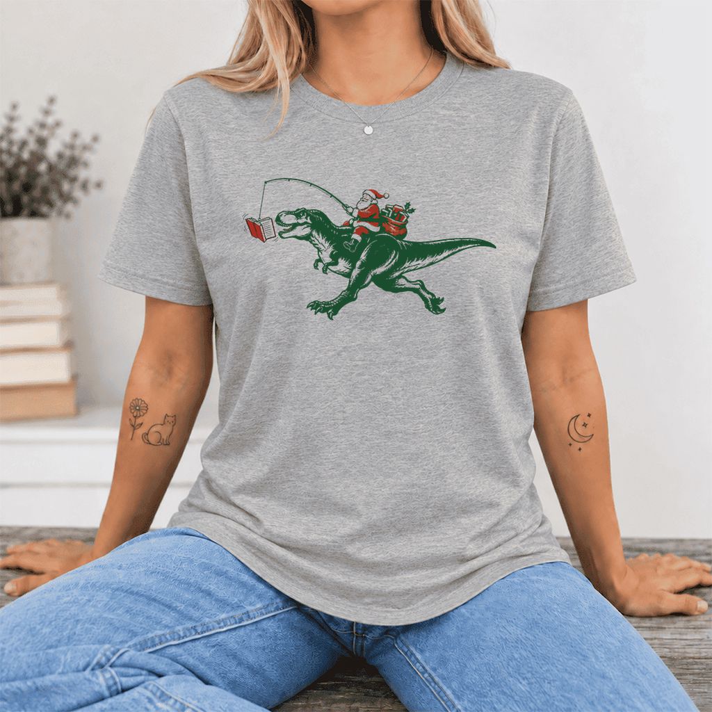 Santa Riding T-Rex Ultra-Soft Cotton T-Shirt | Christmas Reader Gift Athletic Heather