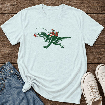 Santa Riding T-Rex Ultra-Soft Cotton T-Shirt | Christmas Reader Gift Heather Ice Blue