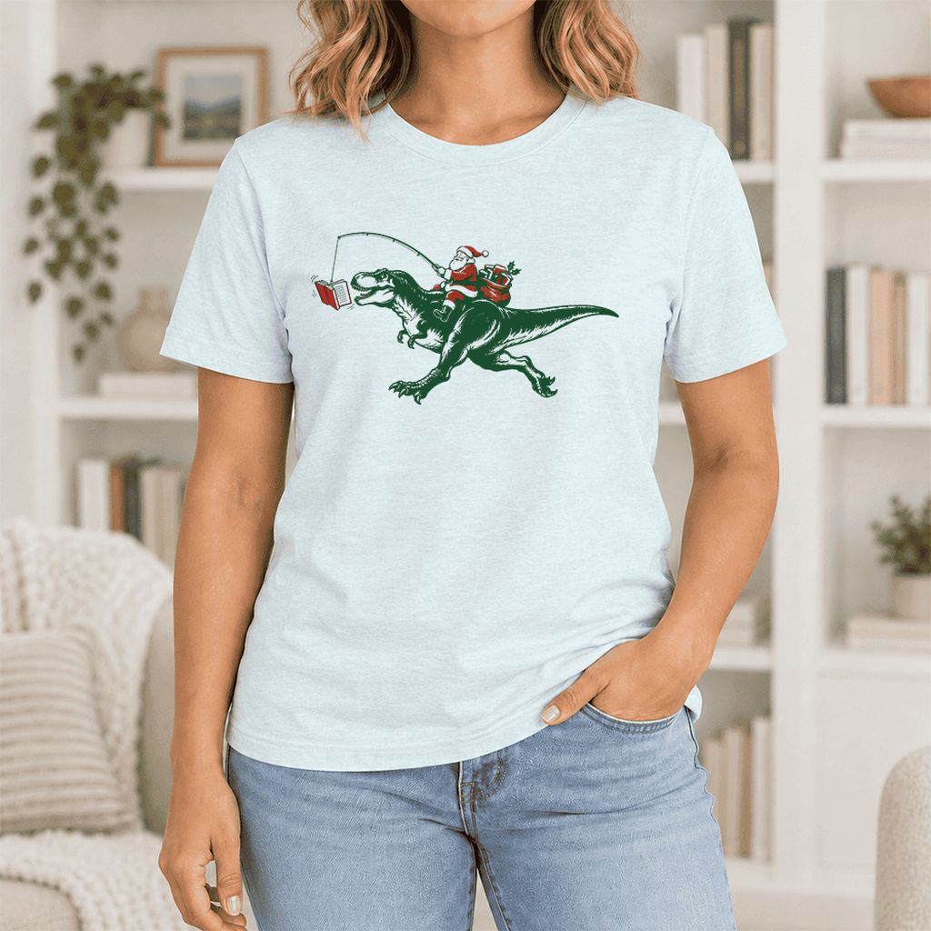 Santa Riding T-Rex Ultra-Soft Cotton T-Shirt | Christmas Reader Gift Heather Ice Blue
